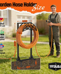 Beefy Heavy Duty Metal Hose Holder With Freestanding Stand And Stable Triangular Base No Wobble Includes 2 Tool Hooks For Outdoor Yard And Lawn Storage Holds Up To 150 Feet Of Hose shown with dimensions and person holding hose in garden.