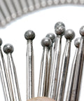 Close-up of 30 Piece Ball Shape Diamond Burr Set For Rotary Tools with ball-shaped grinding heads for precise shaping and cutting.