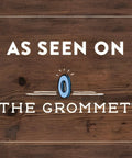 Wooden background with text 'AS SEEN ON THE GROMMET' in white letters centered vertically