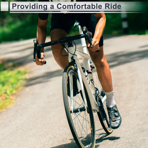 Cyclist riding with Universal Bike Seat Post 300Mm Long 22.2Mm Diameter Lightweight Matte Black Carbon Fiber with Adjustable Head