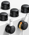 Go To Rotatable Cord Organizer 360 Degree Cable Clips Adhesive Wire Holder for desk, showing 6 black clips with cables.