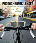 Top Shelf Photochromic Safety Glasses With UV400 Polarized Lenses For Kick Butt Glare Free Vision and Smooth Sun To Shade Adaptation Daily And Weekend Use on a bike handlebar in a sunny urban setting.
