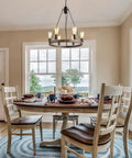 Farmhouse Wagon Wheel Chandelier Eight Light Rustic Round Metal Fixture in dining room with natural rope accents