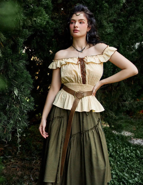 Badass Medieval Leather Belt For Renaissance Cosplay And Hella Cool Pirate Viking Props Featuring Embossed Buckle With Adjustable Waist Strap on model in green setting.