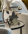 Vintage Eiffel Tower Style Rotary Phone With Push Button Dialing on glass table, Paris Inspired 1892 Reproduction