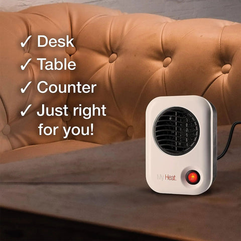 MyHeat 200 Watt Small Energy Efficient Portable Electric Ceramic Space Heater With Cool Touch Exterior For Office Desk And Home White 3 Pack ETL Listed Quiet Fast Heating Desk Side Convenience on a desk near a couch