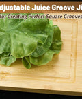 Adjustable Juice Groove Router Jig with 8 Spacers And Four 1/4 Inch Shank Bits Straight Up Game Changing Woodshop Essential on bamboo cutting board with lettuce.