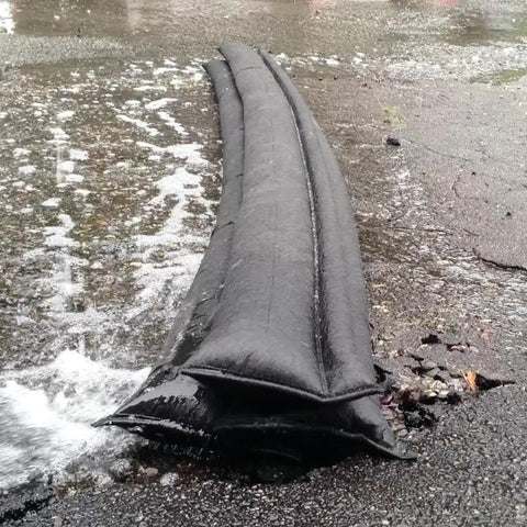 Grab And Go Flood Kit With Five 10ft Flood Barriers In A Bucket Water Activated And Ready To Use barrier blocking water flow