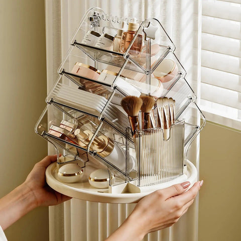 Sturdy Clear Swivel Makeup Organizer, 360 Slick Spin Lazy Susan Tray For Vanities displaying makeup and brushes in clear plastic compartments.