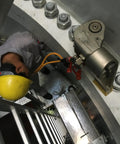 Pro Grade Hydraulic Torque Wrench With Beefed Up Square Drive And Corrosion Proof Alloy Build For Heavy Duty Bolt Tightening That Knocks Out Tough Jobs Daily Without Any Fuss being used on large bolts in an industrial setting.