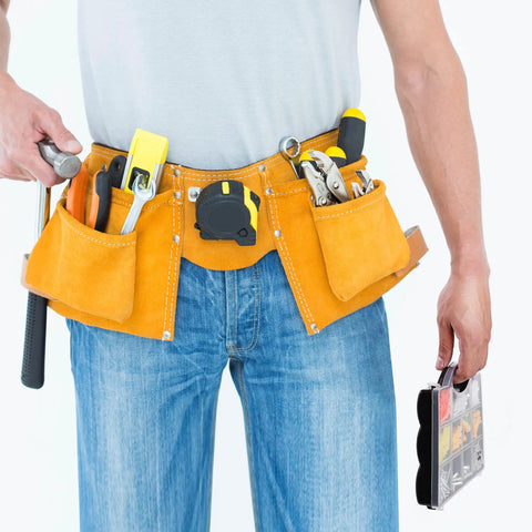 Person with tool belt holding All In One Wall Anchors Kit With 370 Pieces For Picture Hanging And Wall Decor.