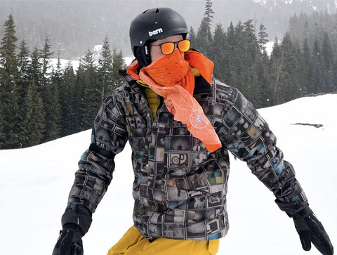 Person wearing Yosemite Map Survival Bandana And Grab-and-Go Emergency Navigation Scarf, Blaze Orange Waterproof Signal Triangle.