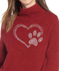Woman wearing red sweater with Crystal Clear Hotfix Rhinestone Iron On Transfer With 10ss Gems, Heart With Paw Print Design.