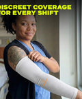 Person wearing UV Shield Arm Sleeves for men and women, 10 pair cooling compression, tattoo cover up, sun protection for work.