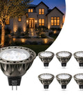 Heavy Duty Mr16 Led Bulbs 2700K Warm White Gu5.3 Base Non Dimmable 6 Pack displayed with illuminated house and landscape.