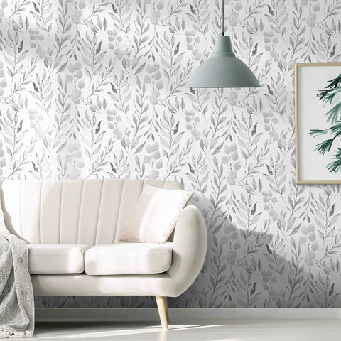 Gray Leaf Peel and Stick Wallpaper Dope Look Floral Self Adhesive Watercolor Leaves for Cabinets and Walls Removable Botanical Contact Paper Easy Peel and Stick Vibe Elegant Gray Wall Decor 17.7 by 394 Inches covering a living room wall with a modern sofa and lamp.