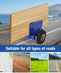 Built Like A Tank Heavy Duty Panel Cart Dolly Supporting 550 Lb Loads With Grippy Pneumatic Wheels on road with various surfaces.