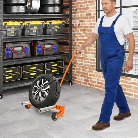 Man using Beefy Heavy Duty Tire Dolly For Garage And Auto Repair Wheel Tire Moving Cart For Transferring Heavy Wheels Safely with orange handle