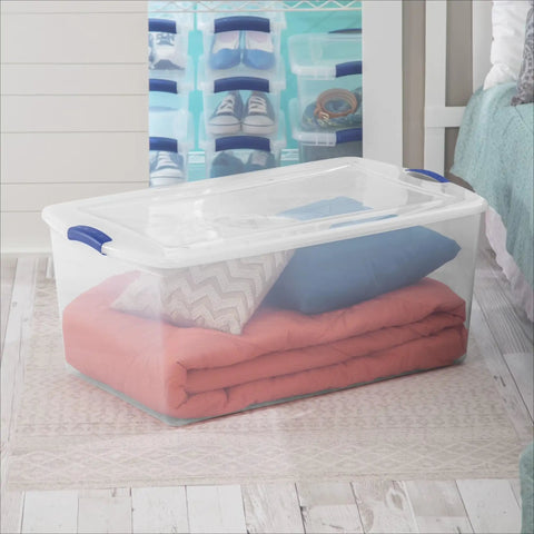 Extra Large Clear Storage Bin with Lid Stackable Plastic Tote Hella Spacious Snap Latch for storing blankets and cushions.