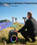 Person using Wireless Karaoke Microphone System For Singing, Crazy Long Range 500ft 150m in outdoor setting with dual mics.