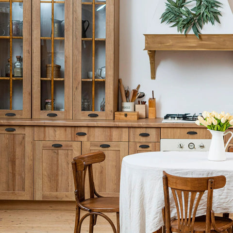 Rustic kitchen with wooden cabinets featuring 10 Pack Matte Black Cup Pulls Three And Three Quarters Inch Hole Center Zinc Alloy Cabinet Handles.