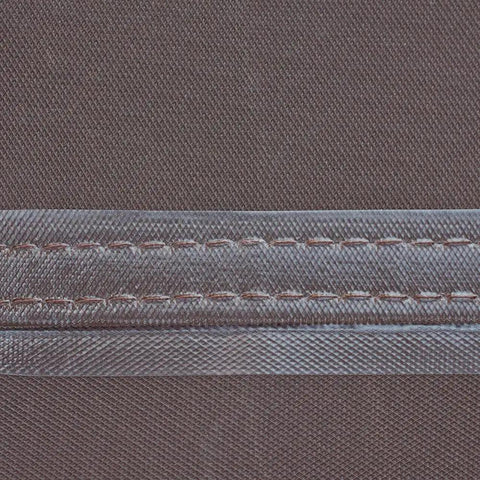 Close-up of taped seams and stitching on Ultimate Waterproof 34 Inch Round Fire Pit Cover For Outdoor Patios, Fits Pits Up To 34 Inch Diameter And 24 Inch High