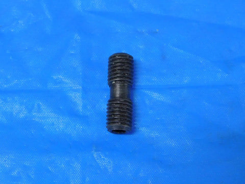 Straight Up 1/4 28 Differential Screw Stainless Steel Flat Head Fully Threaded Right Hand Lock Pin Rock Solid Machine Fastener Precision Adjustment Hardware Single Piece on blue background.