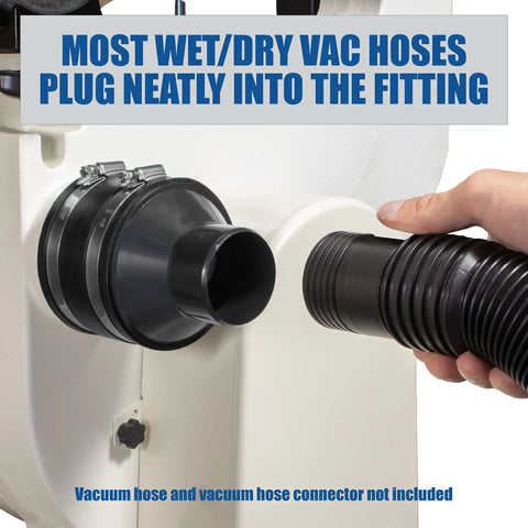 Four Inch To Two And A Half Inch Reducer with rubber cuff coupler connecting a black vacuum hose to machinery dust port