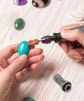 Four Piece Die Grinder Collet Set With 6mm Collets For One Quarter Inch Arbors in use on turquoise stone