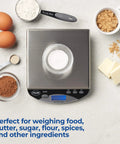 Go To Portable Precision Digital Kitchen Scale For Baking And Cooking With One Kilogram Capacity And One Tenth Gram Increments Compact Lightweight Food Scale For Butter Sugar Flour And Other Ingredients shown with ingredients including sugar, butter, and eggs.