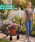 Lightweight Folding Wagon Cart With 350 Lb Capacity For Groceries Camping Gear Garden And Beach Trips Portable Foldable Utility Cart In Black For Everyday Hauling At The Park Farmers Market Or Job Site being used in a garden