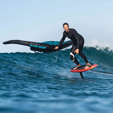 Rider using V3 Inflatable Wingsurfing Wing 3.0m Blue For Power Packed Performance Easy Control Smooth Takeoffs In Waves Lightweight Stability