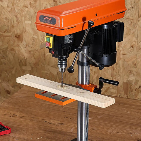 10 Inch Benchtop Drill Press With 6.2A Induction Motor Multi Speed Tabletop Drill Press Adjustable 0 To 45 Degree Tilting Worktable LED Work Light Do It All For Wood And Metal Projects in use drilling a wooden plank