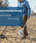 Person using Heavy Duty Sand Scoop For Metal Detecting With Long Handle Stainless Steel Detector Shovel on beach