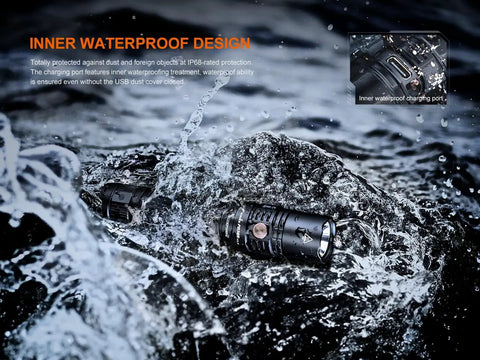 PD36R V2.0 1700 Lumen USB Type C Rechargeable EDC Tactical Flashlight Built For Everyday Carry With Dual Power Sources and LumenTac Organizer shown in water emphasizing its waterproof design.