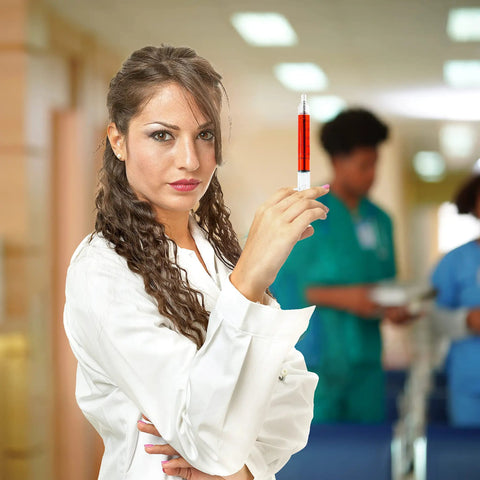 Woman holding a syringe pen from 36 Pack Syringe Pens Set With Retractable Tip In Multi Color Ink Red Black Blue For Nurse Gifts