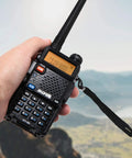 Person holding Six Pack GT5R Ham Radios Handheld Dual Band Two Way Radios FCC Compliant with long range performance