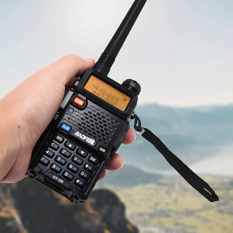 Person holding Six Pack GT5R Ham Radios Handheld Dual Band Two Way Radios FCC Compliant with long range performance