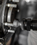 Close-up of air hammer chisel in use, Air Hammer Chisel Set In Portable Tool Roll, 5-Piece With Beefy Bits And.401 Shank.