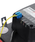 Diversitech ULTRACP-22 condensate pump top view with blue terminal connector and yellow wires.