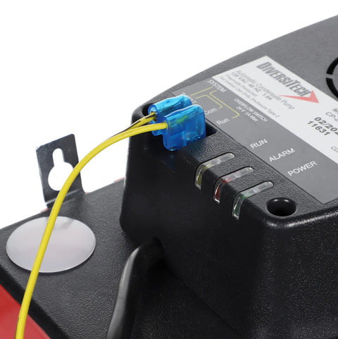 Diversitech ULTRACP-22 condensate pump top view with blue terminal connector and yellow wires.