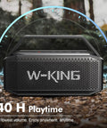 Beast Bluetooth Speaker for Outdoors 100W Peak Power IPX6 Waterproof Boombox shown in a forest setting with handle