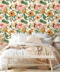 Vintage Boho Floral Peel And Stick Wallpaper With Peonies In Rose Beige Pink And Olive behind a cozy bedroom setting.
