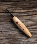 Tough As Nails 1.5 mm Micro Shallow U Gouge High Carbon Steel Wood Carving Tool With Rock Solid Ash Wood Handle For Premium Clean Cuts And Razor Sharp Detailing Made In Usa on wooden surface.