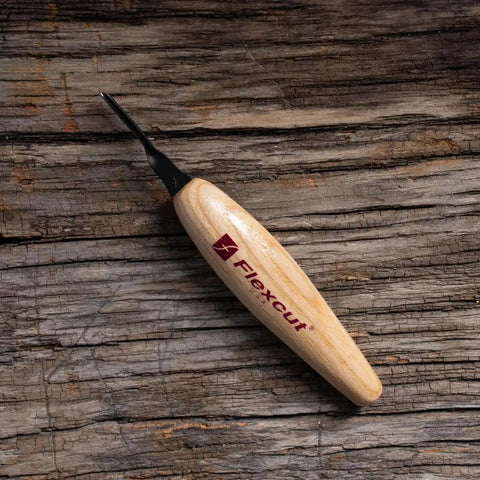 Tough As Nails 1.5 mm Micro Shallow U Gouge High Carbon Steel Wood Carving Tool With Rock Solid Ash Wood Handle For Premium Clean Cuts And Razor Sharp Detailing Made In Usa on wooden surface.