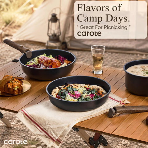 Detachable Handle 19 Piece Nonstick Cookware Set For Induction Cooktops displayed with food on a picnic table.