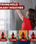 Woman applying Transparent Window Weather Stripping Tape 2 Inch By 30 Yard Pack Three No Residue Insulation Seal for Winter, strong hold.