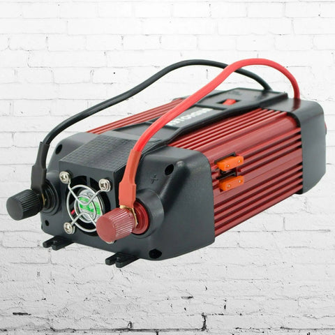 Heavy Duty 1500W Power Inverter Dc 12V To Ac 110V Car Converter with cooling fan, red and black design for RV and camp use.