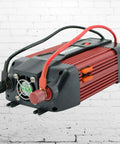 Heavy Duty 900W Peak Power Inverter Converts Dc 12V To Ac 110V with red cables, fan, and cooling fins for car truck RV energy use.