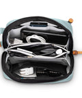 Open Compact Travel Tech Organizer Bag for Cables Chargers and Gadgets with Leather Accents showing contents inside in dusty teal